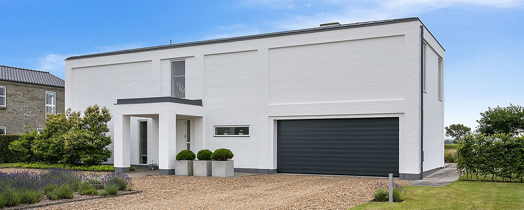 Wide black garage door header